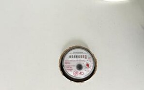 A circular hole in a wall with a label that includes text and logos. - 4 Star Holiday Home in Borkop (Borkop)