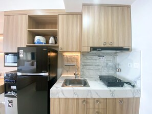 Studio | Private kitchen | Full-size fridge, stovetop - Good Deal And Elegant Studio Vasanta Innopark Apartment (Cikarang)