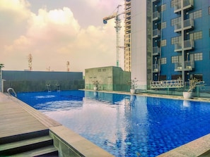 Pool - Minimalist Studio Room At Evenciio Margonda Apartment (Depok)