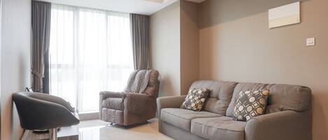 Apartment | Wohnbereich | Fernseher