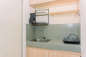Appartement | Privékeuken | Een koelkast/vriezer, een kookplaat