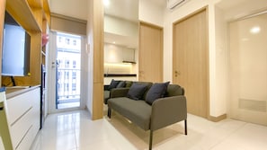 Appartement | Aire de séjour | Téléviseur