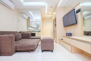 Apartment | Wohnbereich | Fernseher