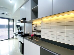 Private kitchen - Cozy Stay Studio At Sayana Bekasi Apartment (Tarumajaya)
