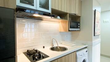Apartment | Private kitchen | Full-size fridge, stovetop