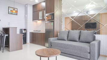 Apartamento | Área de estar | TV