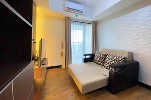 Apartment | Wohnbereich | Fernseher