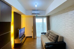 Apartment | Wohnbereich | Fernseher