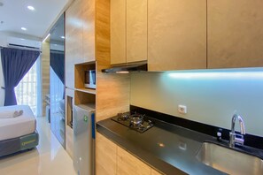 Studio | Private kitchen - Elegant And Homey Studio Ciputra World 2 Apartment (Jakarta)