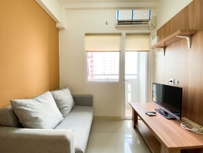 Apartment | Living area | TV - Comfort And Strategic 2Br At Green Pramuka City Apartment (Jakarta)