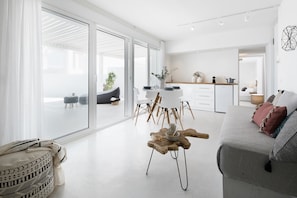 Luxury Apartment | Living area | 25-inch Smart TV with satellite channels - Infinite Blue Luxury Suites (Santorini)
