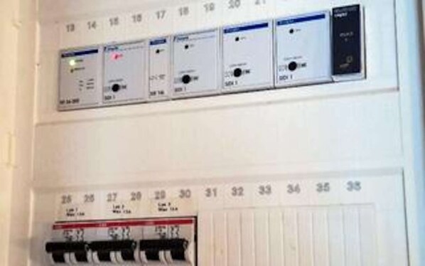A control panel with numbered switches and a thermostat. - 4 Star Holiday Home in Skagen (Skagen)