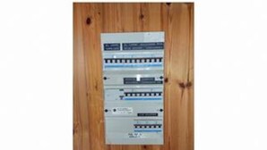 A wall-mounted electrical panel with multiple circuit breakers and switches. - 8 Person Holiday Home in Blavand (Blavand)