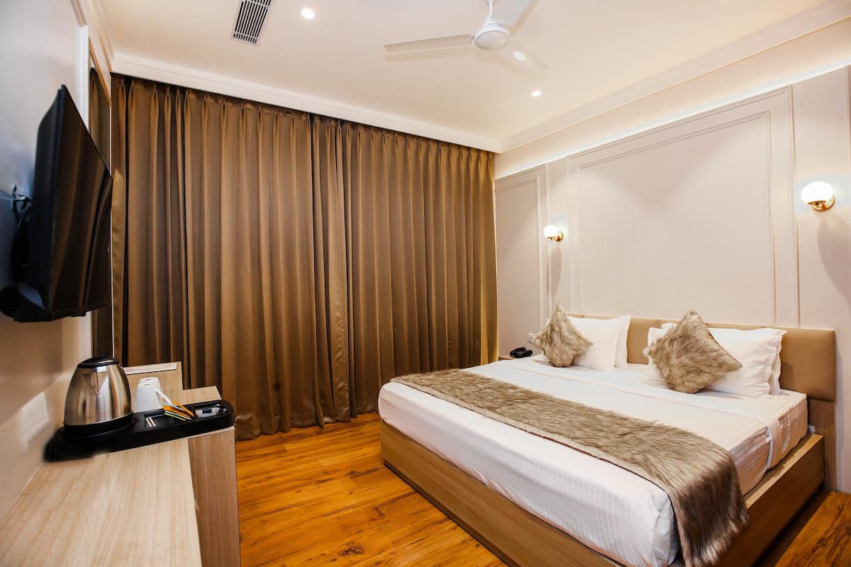 Deluxe-Zimmer, Stadtblick | Minibar, Verdunkelungsvorhänge, schallisolierte Zimmer