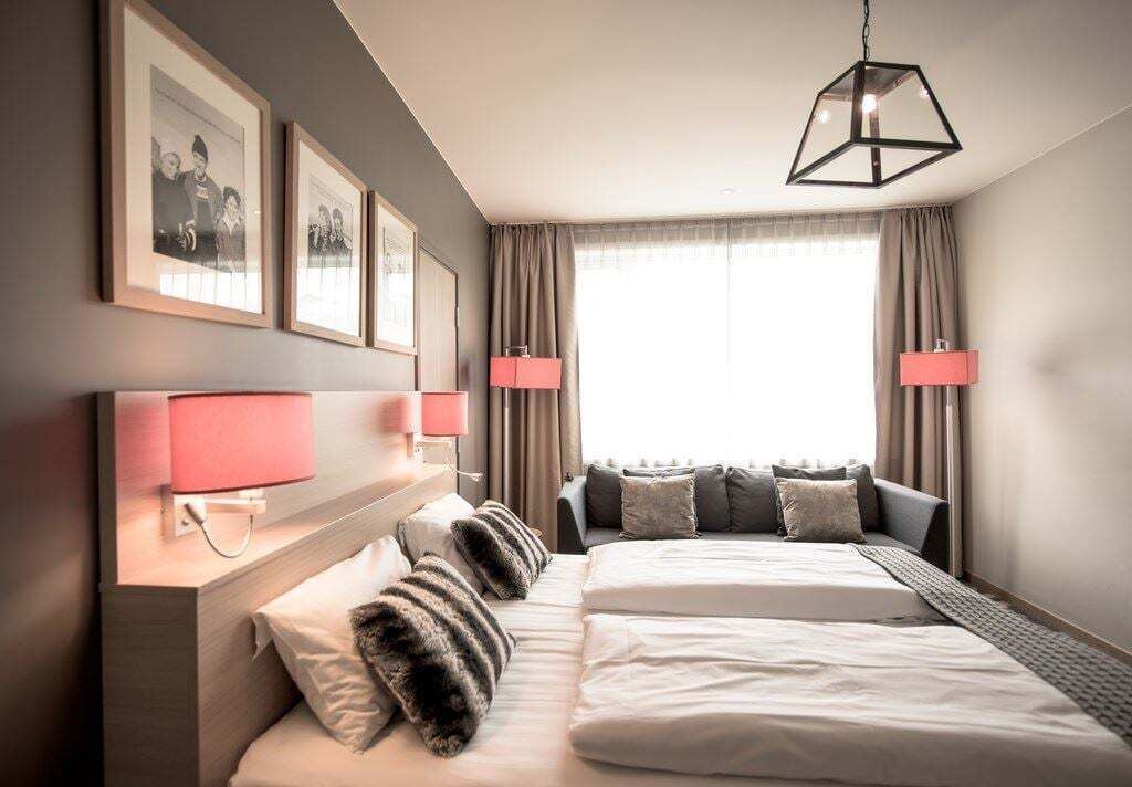 Premium bedding, pillow-top beds, desk, laptop workspace