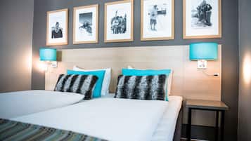 Premium bedding, pillow-top beds, desk, laptop workspace