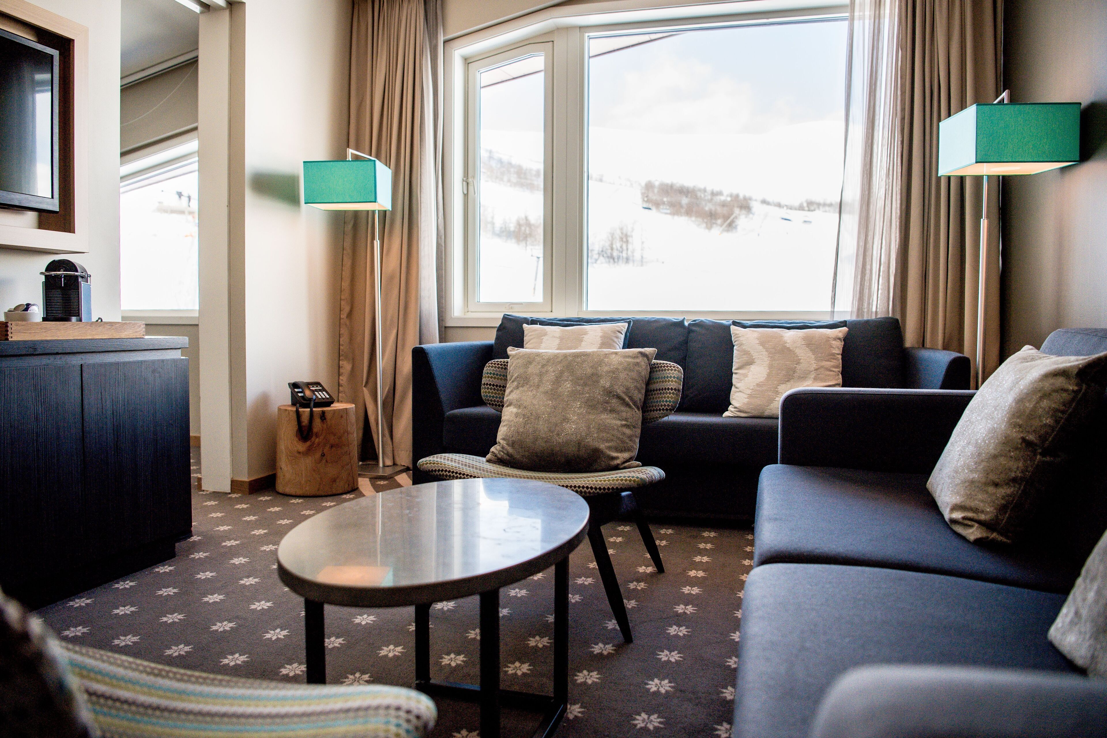 Deluxe Suite | Living area | Flat-screen TV