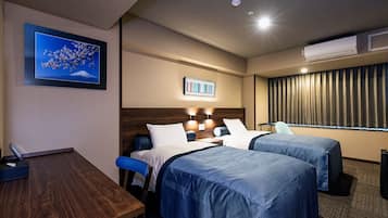 Chambre avec lits jumeaux, 2 lits une place, non-fumeurs | Coffres-forts dans les chambres, bureau, Wi-Fi gratuit, draps fournis