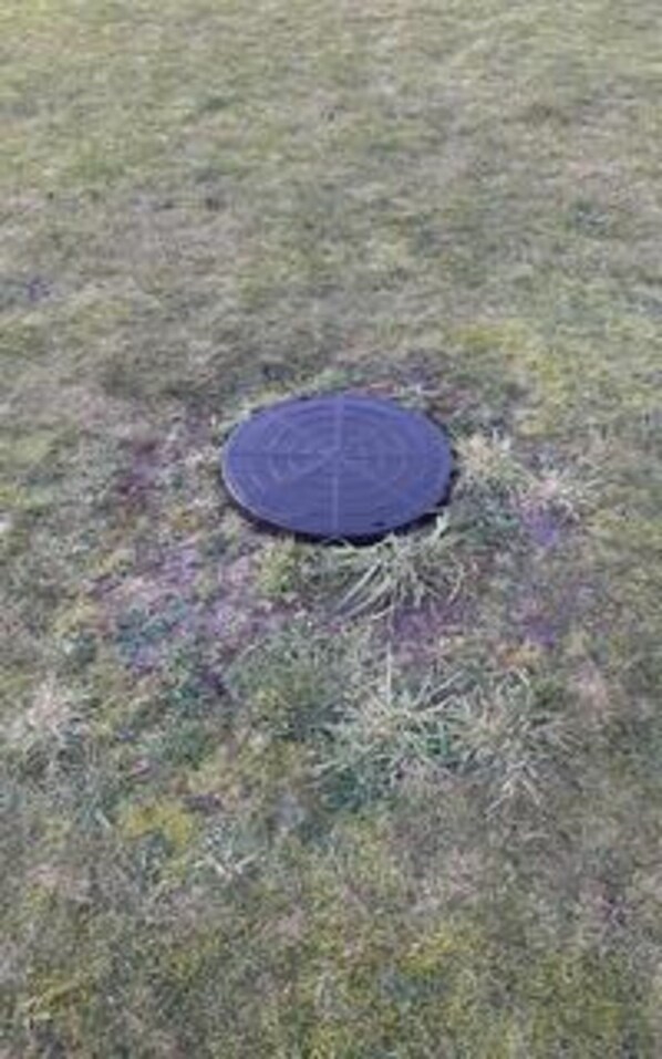 A circular object on a grassy field. - 5 Star Holiday Home in Lokken (Lokken)