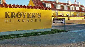 A yellow building with "KROYER'S GL. SKAGEN" signage, indicating a hotel or lodging establishment. - 6 Person Holiday Home in Skagen (Skagen)
