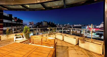 Spacious modern apartment. Large balcony overlooking the city line and mountains