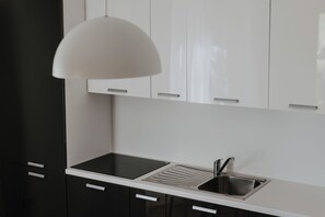 Leilighet – panorama | Eget kjøkken | Høy barnestol og spisebord