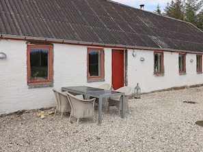 A white building with a red door and multiple windows. - 12 Person Holiday Home in Thisted (Frøstrup)
