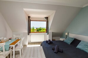 Deluxe Studio | In-room safe, blackout drapes, iron/ironing board