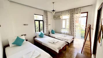 Standard Triple Room, 3 Twin Beds | Free WiFi, bed sheets