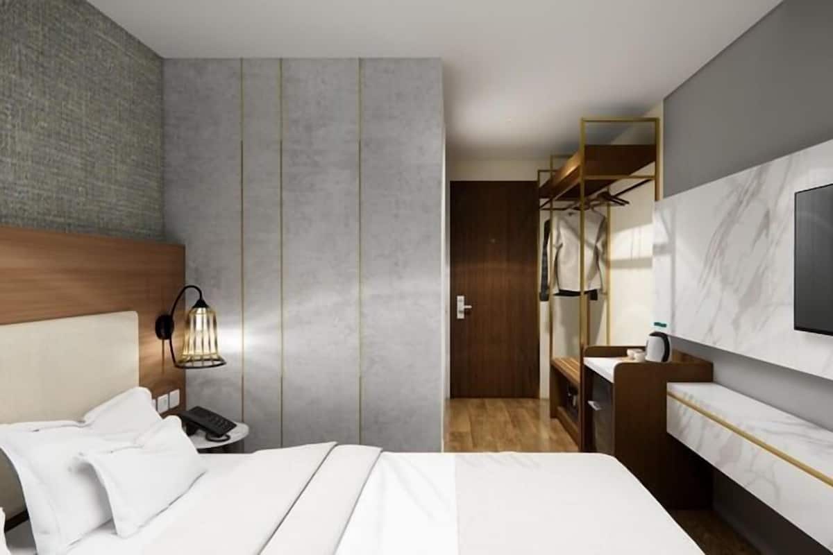 Escritorio, wifi gratis y ropa de cama