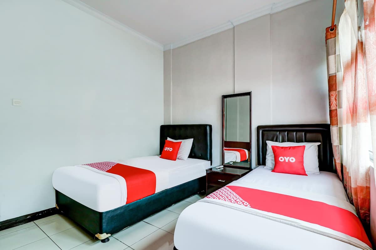 Chambre avec lits jumeaux