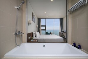 Executive Studio Suite, 1 King Bed, Non Smoking, Sea View | Bathroom | Hair dryer, bathrobes, slippers, bidet - Mangata Beachfront Hotel (Da Nang)
