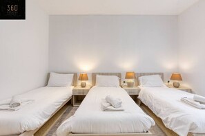 3 bedrooms, desk, iron/ironing board, travel cot