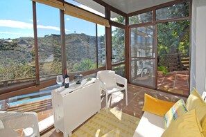 Smart TV, fireplace, books, printers