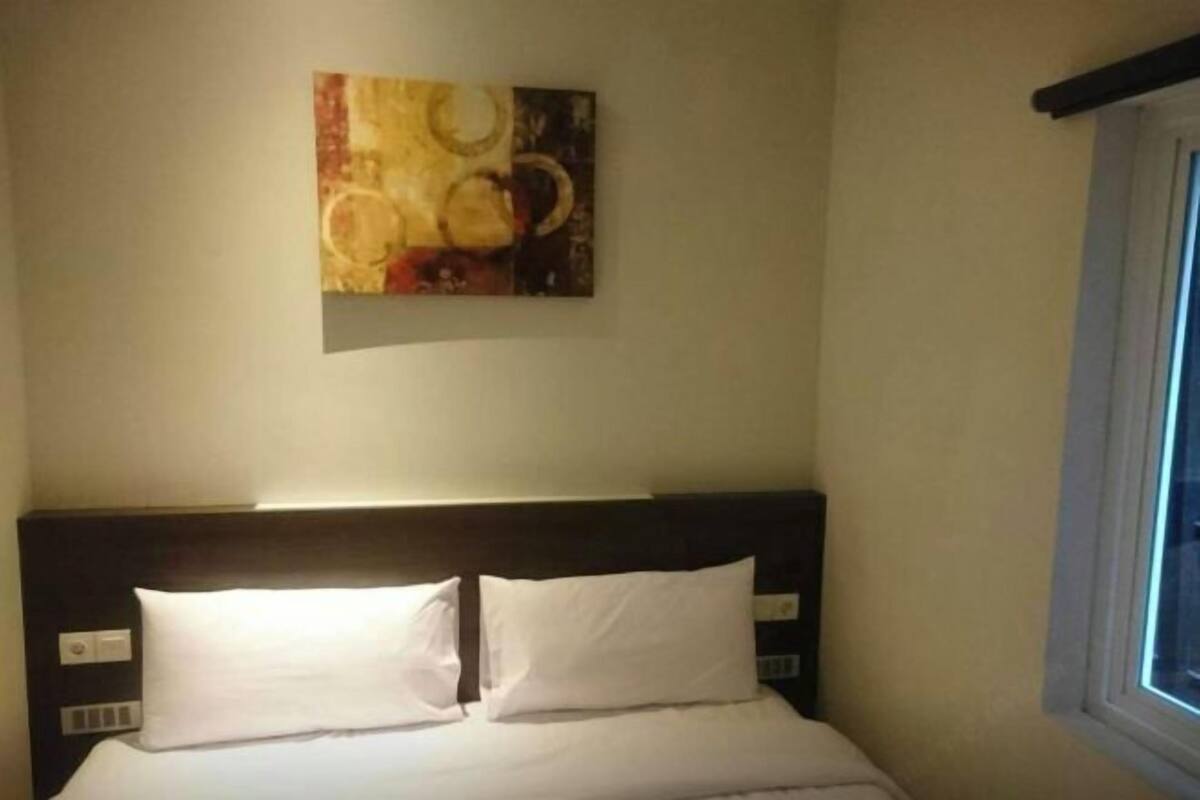 Desk, laptop workspace, blackout curtains, free WiFi
