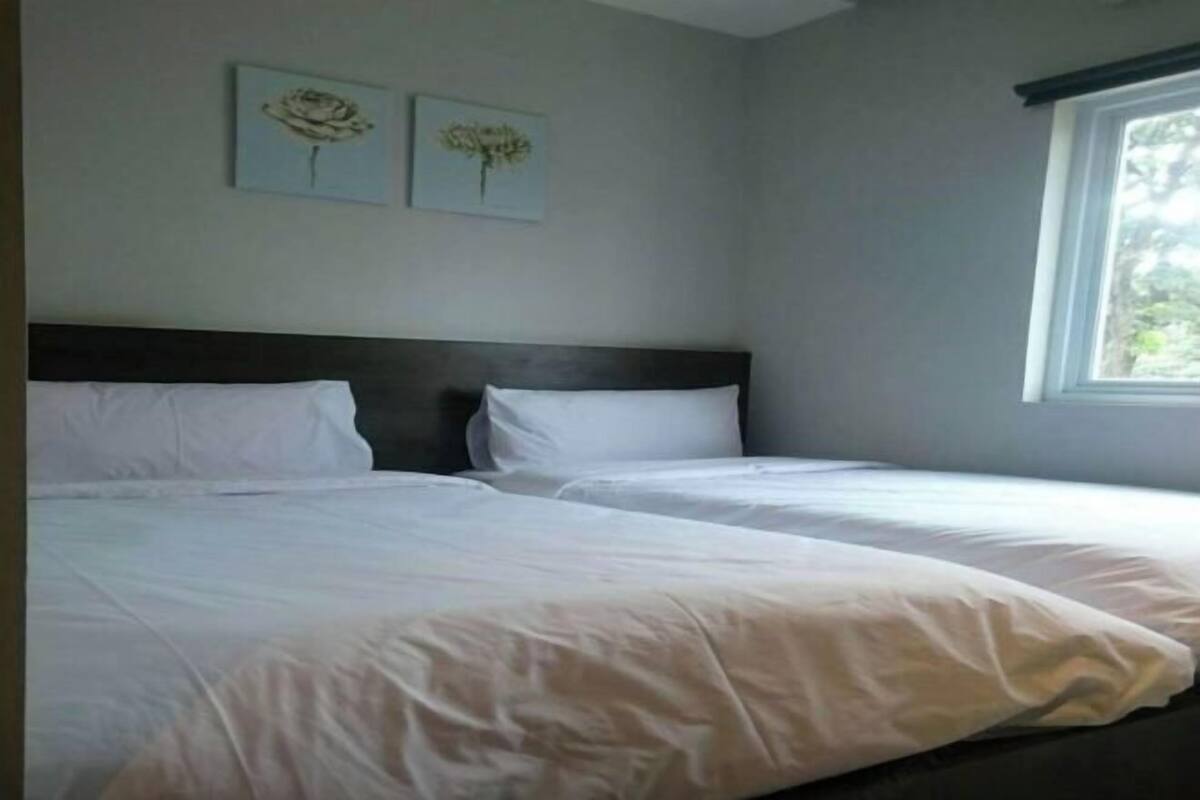 Desk, laptop workspace, blackout curtains, free WiFi