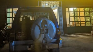 A vehicle parked in front of a building with a sign reading "THE HOTEL NANGLO". - The Hotel Nanglo (Taplejung)