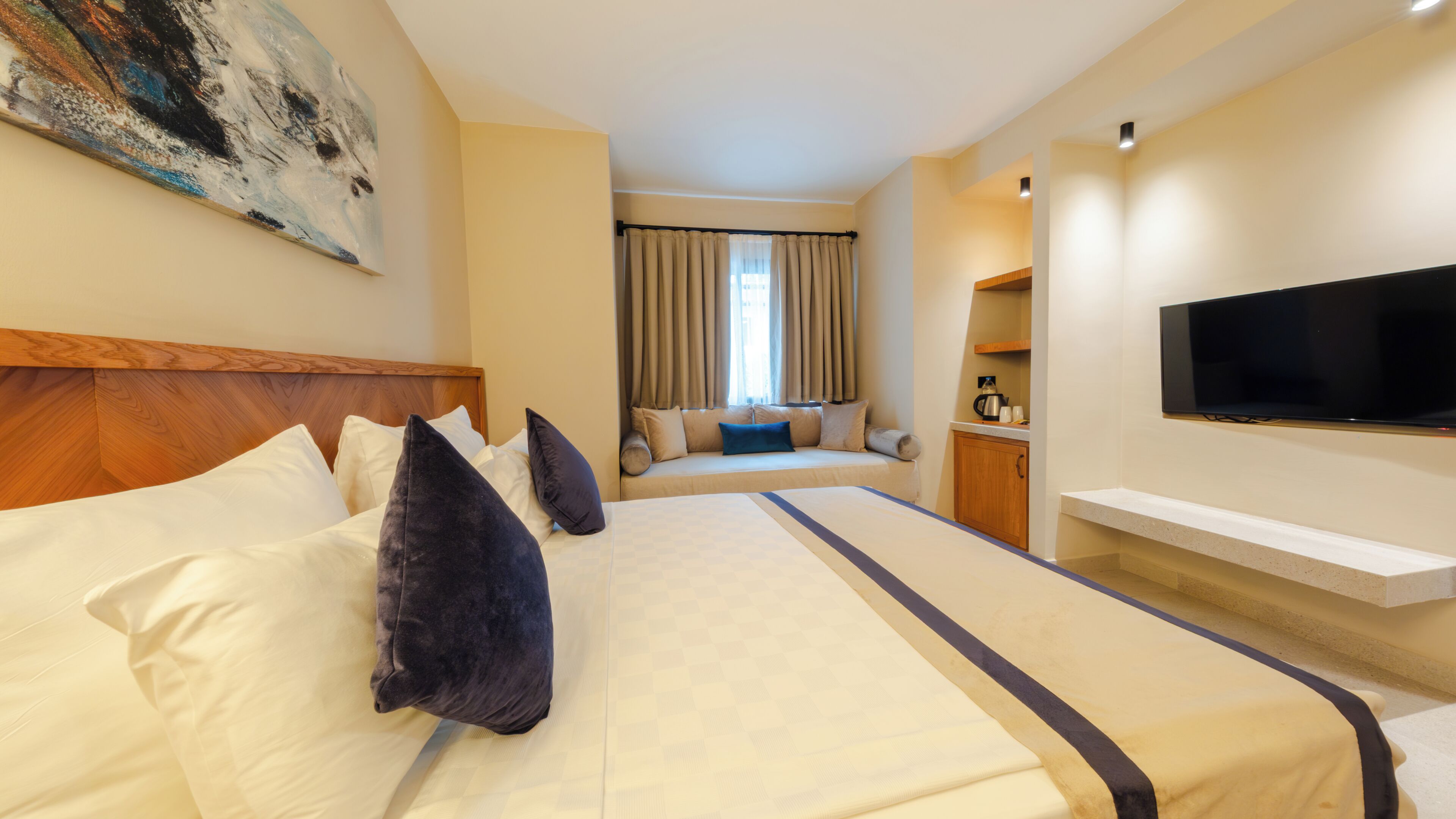 Free minibar, in-room safe, desk, laptop workspace