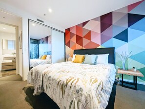 1 bedroom, desk, iron/ironing board, travel crib