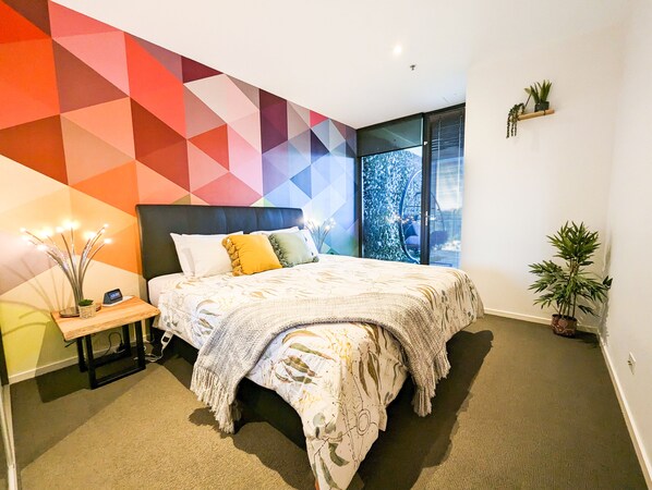 1 bedroom, desk, iron/ironing board, travel crib