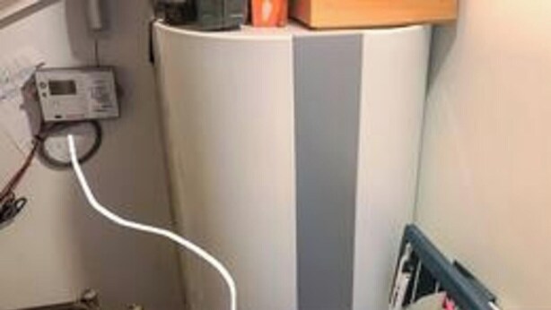 A cylindrical water heater with a control panel and a power cord. - 5 Star Holiday Home in Bagenkop (Sydlangeland)