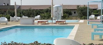 Apartamento vacacional "Le Scuderie 4" con piscina compartida, terraza compartida y Wi-Fi