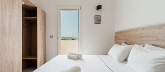 Holiday Apartment "Le Scuderie 10" with Balcony, Shared Pool & Wi-Fi