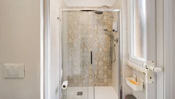 Shower, free toiletries, hair dryer, towels