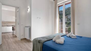 2 dormitorios, tabla de planchar con plancha, wifi gratis y ropa de cama