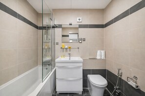 Shower, hair dryer, towels