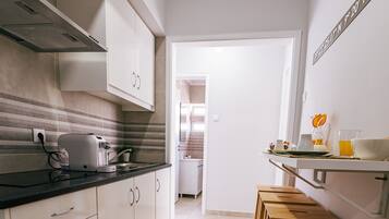 Fridge, microwave, coffee/tea maker, toaster