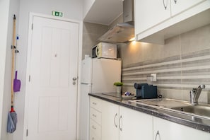 Fridge, microwave, coffee/tea maker, toaster