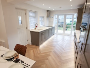 Cottage | Private kitchen | Fridge, dishwasher, electric kettle, toaster - By the Tracks (Buxton)