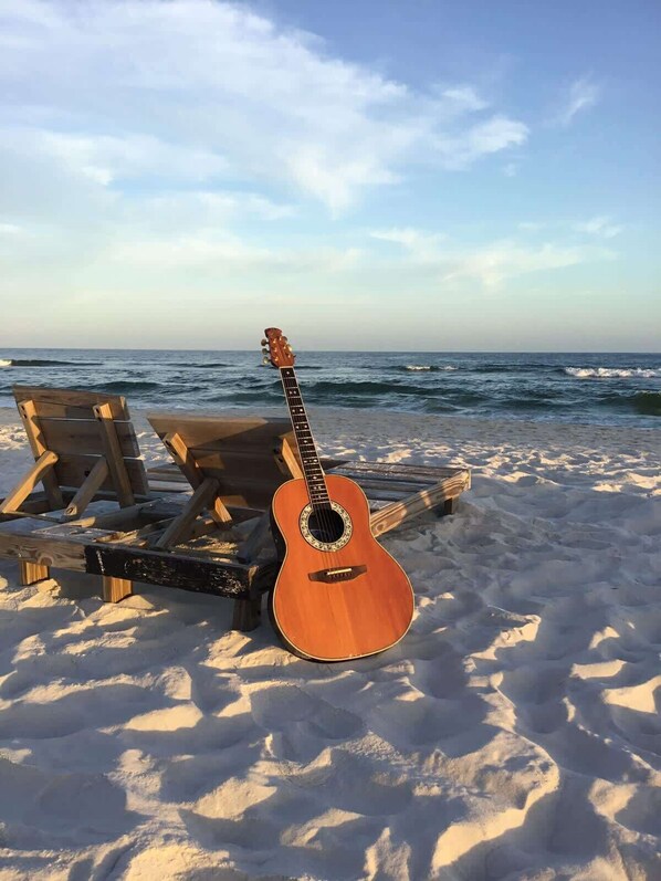 On the beach, sun-loungers, beach towels